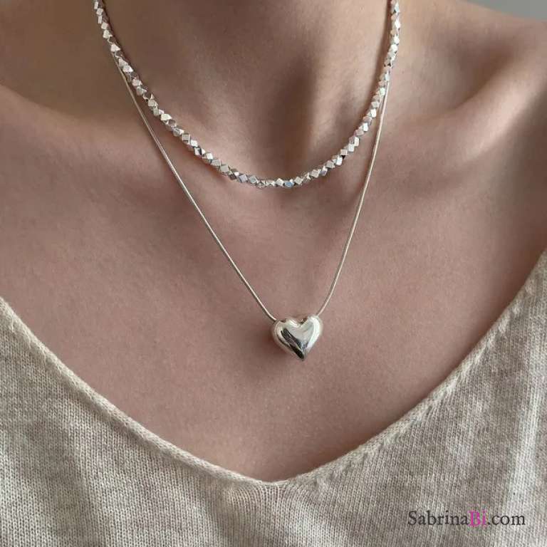Collana Snake tonda con cuore passante