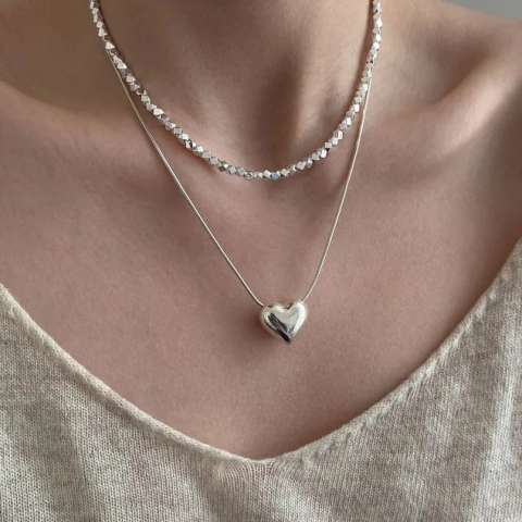 Collana Snake tonda con cuore passante