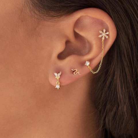 Snake gold piercing